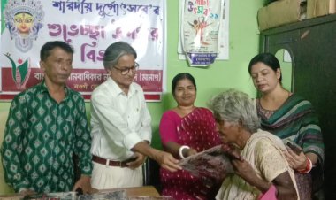 নওগাঁয় দুর্গোৎসব উপলক্ষে মানাপ এর বস্ত্র বিতরণ