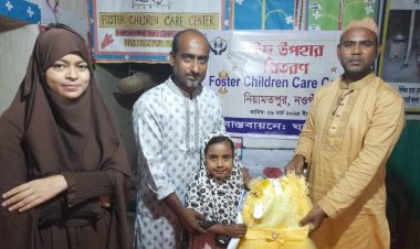 নিয়ামতপুরে এতিম বাচ্চাদের মাঝে জামাকাপড় ও ঈদ সামগ্রী বিতরণ